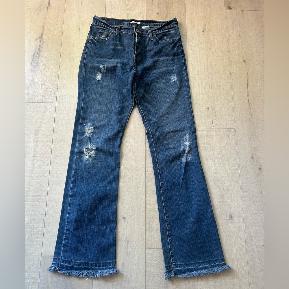 Levi's Blue Boot Cut Jeans with Distressed Details